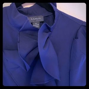 Gracia Purple with ruffle in the front . Size M